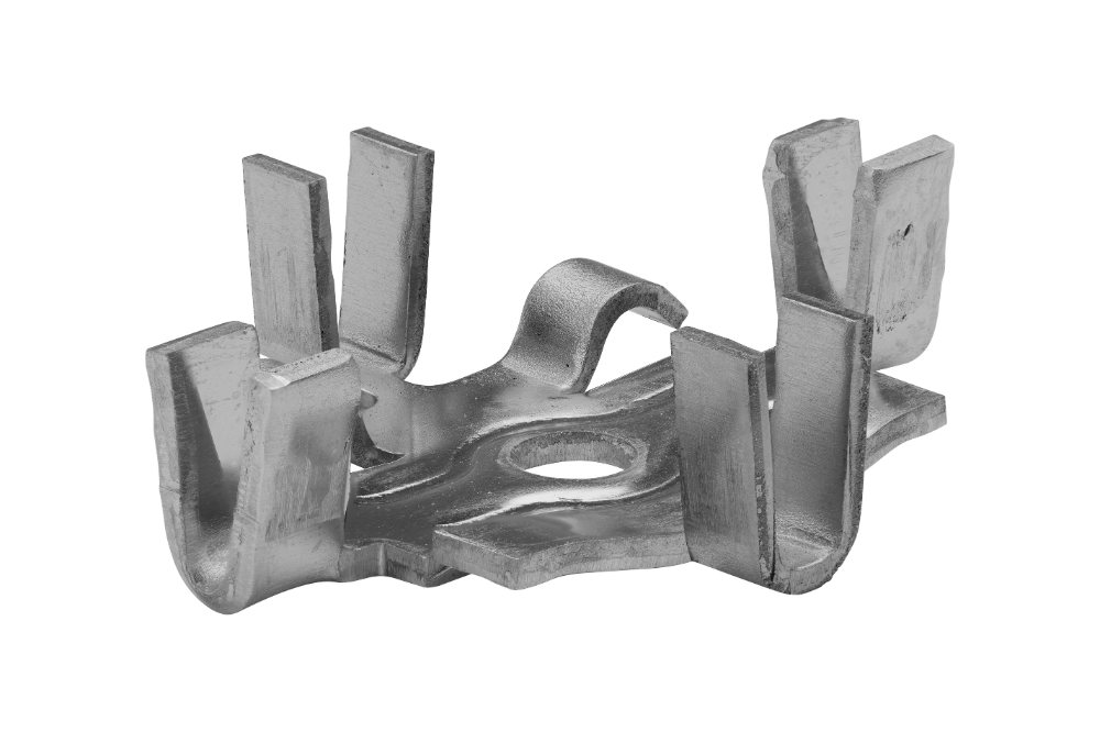 Formed stamped part with several bent-up tabs